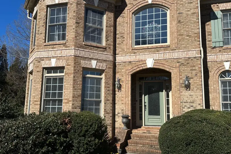 Completed window replacement on a brick Metro Atlanta home